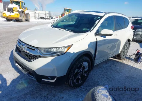 2017 Honda Cr-V Touring z USA, uszkodzony, nr VIN 2HKRW2H96HH614697